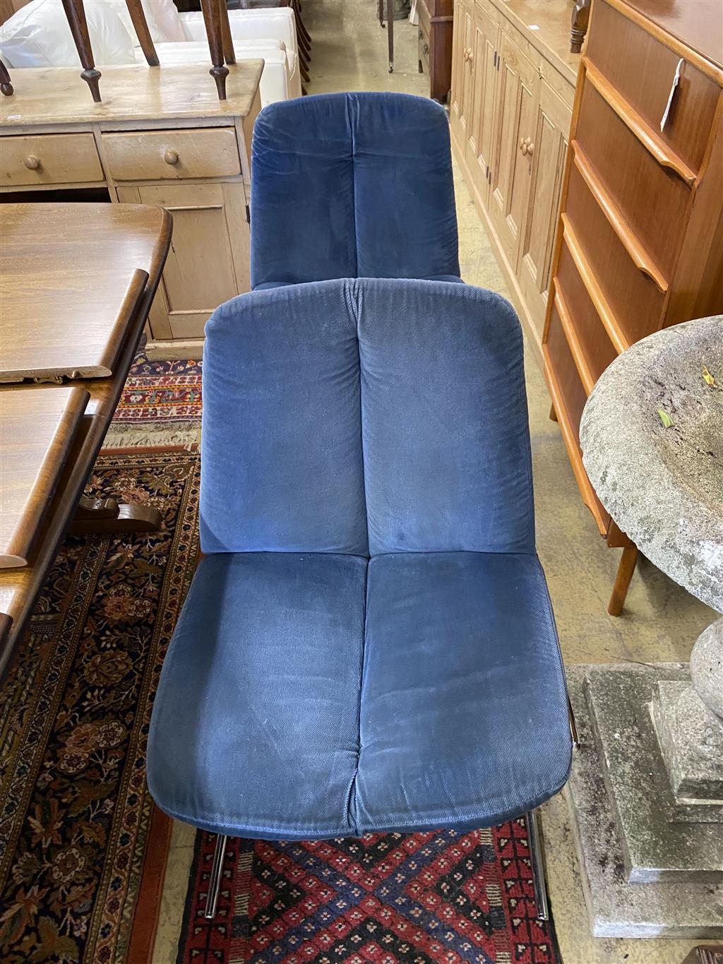 A set of four Pieff Eleganza blue fabric and chrome dining chairs